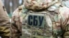 "Мы найдем этих нелюдей!" Как в Украине и в мире реагируют на кадры с обезглавливанием военного