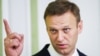 RUSSIA -- Opposition activist Aleksei Navalny attends a hearing to review his and his brother Oleg's sentences in the so-called Yves Rocher case, at the Russian Supreme Court, Moscow, April 25, 2018