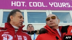 Владимир Путин и министр спорта Виталий Мутко на Олимпиаде в Сочи