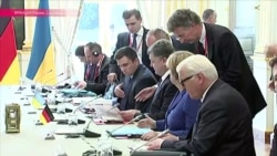 О чем договорились три президента и канцлер в Париже О чем договорились три президента и канцлер в Париже
