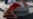 RUSSIA -- An activist attends a protest against torture, next to the World Cup mascot Zabivaka, outside the Saint Petersburg stadium in St. Petersburg, Russia July 3, 2018