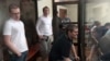 Фигуранты дела группы "Новое величие" (слева направо) Вячеслав Крюков, Дмитрий Полетаев и Петр Карамзин
