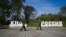 RUSSIA -- Russian guards walk along a platform past signs, which read "Russia" (R) and "DPRK"(Democratic People's Republic of Korea), at the border crossing between Russia and North Korea, in the Primorye region, September 26, 2017